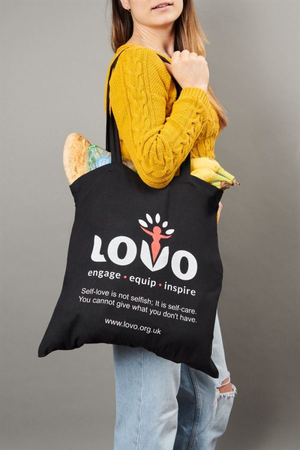 Woman with a LOVO bag on her shoulder